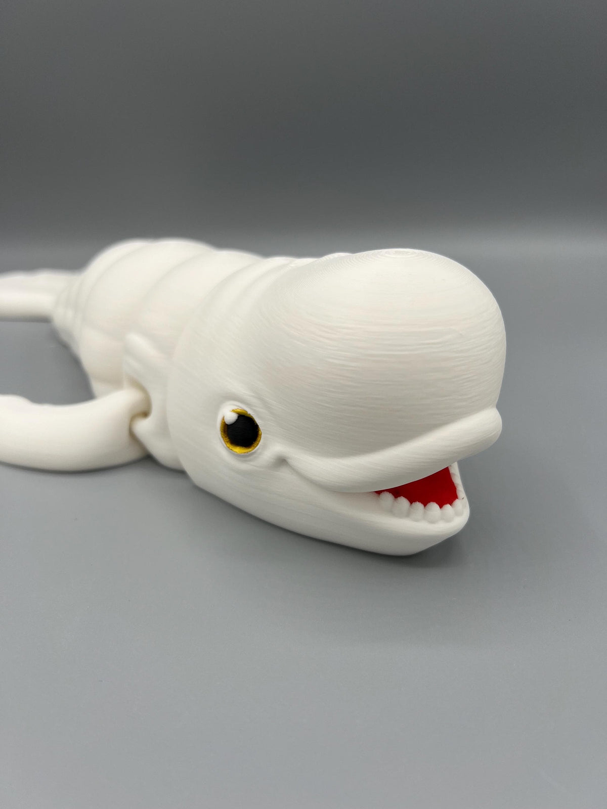 3D Printed Articulating Beluga Whale: Customizable Fidget Toy
