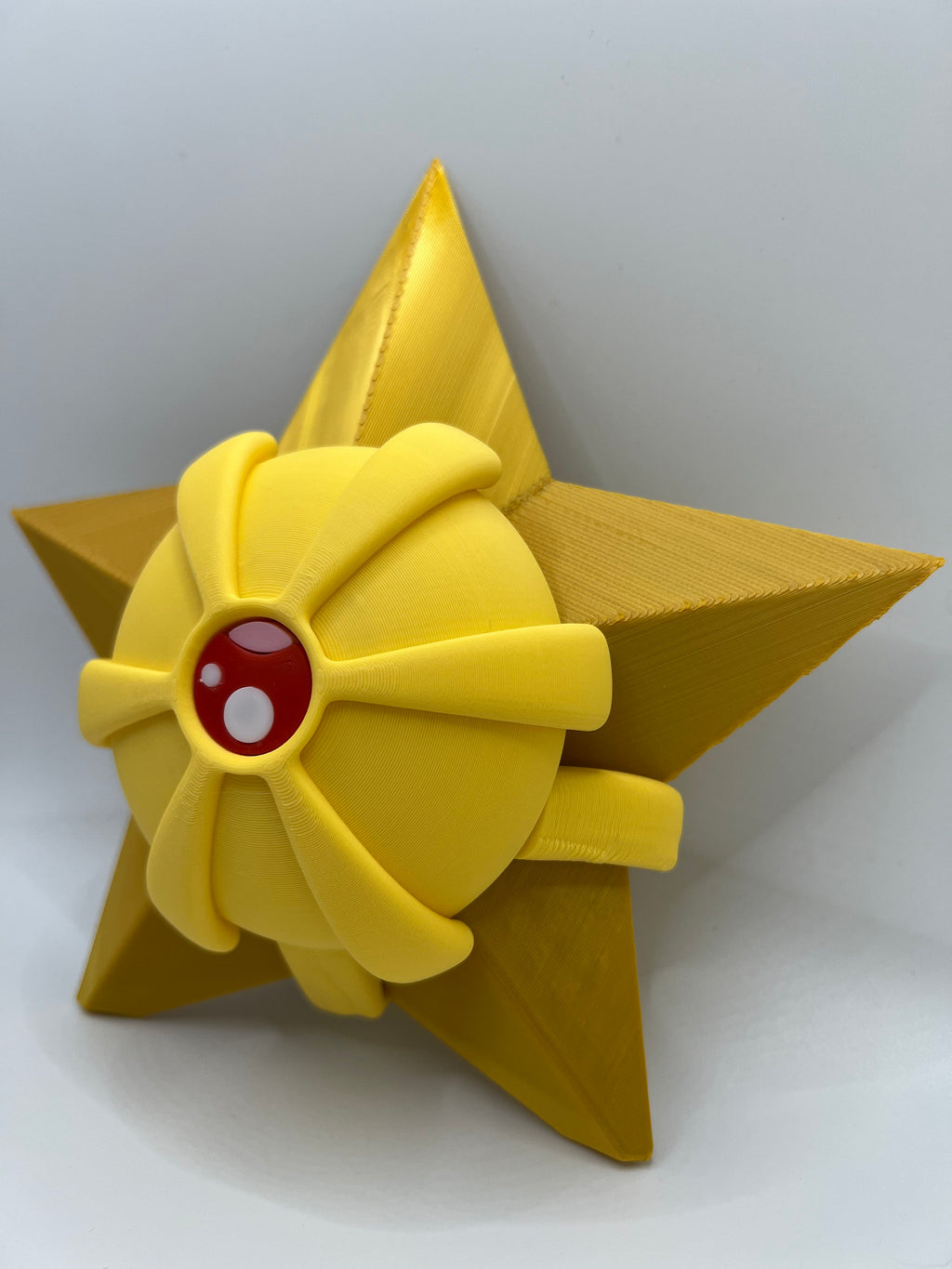 3D Printed Staryu Figurine: Golden Pokémon Collectible & Desk Decor