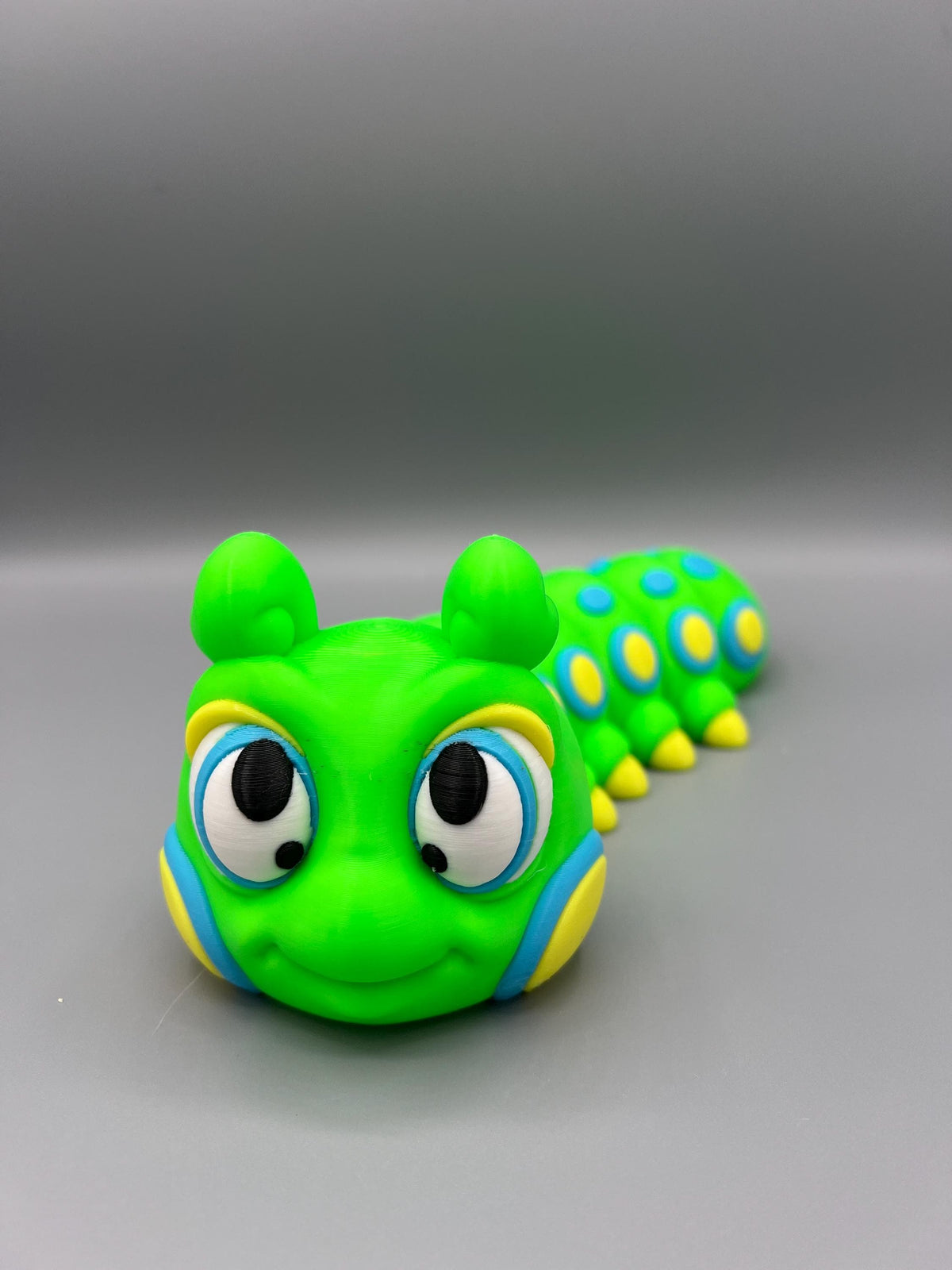 3D Printed Flexi Caterpillar Toy: Articulating Fidget Insect - UV Reactive